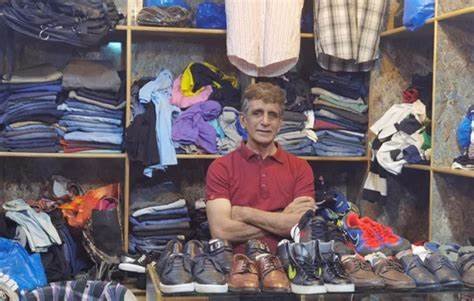 Asad Rauf selling shoes