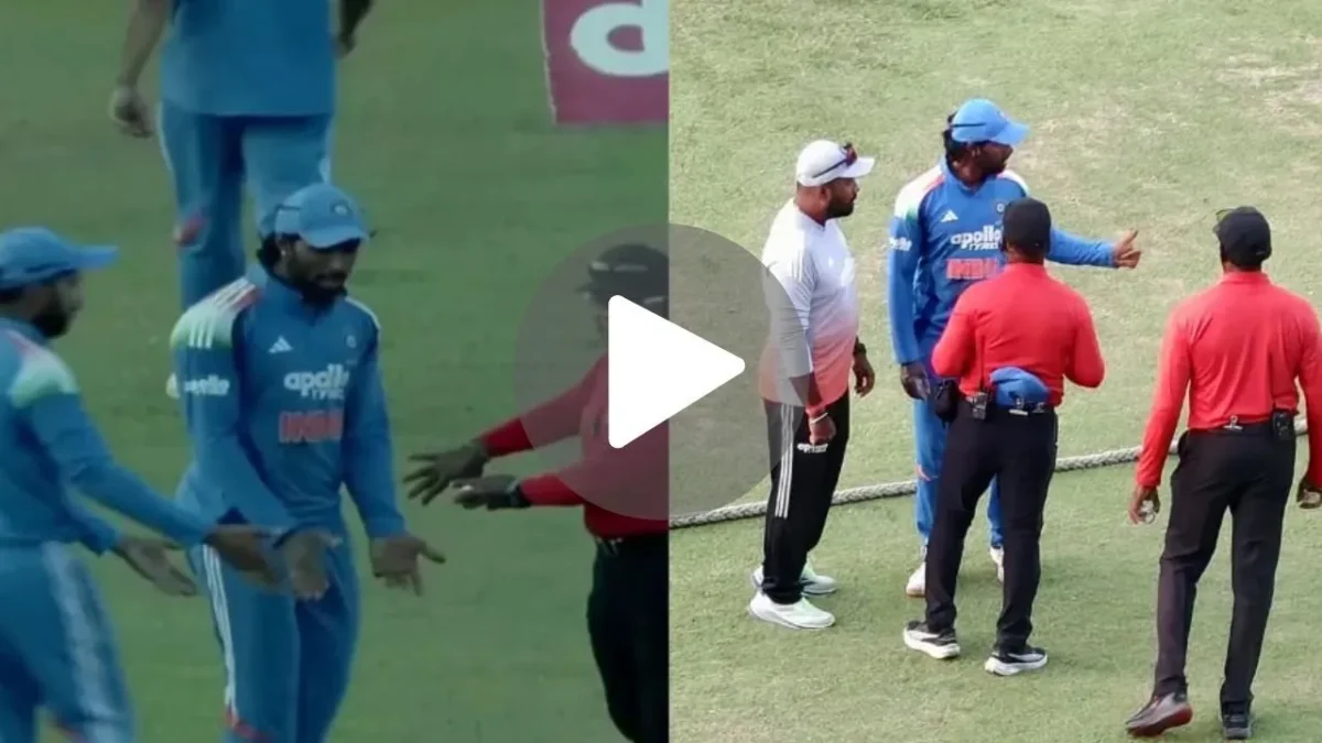 Tilak Varma with Umpire